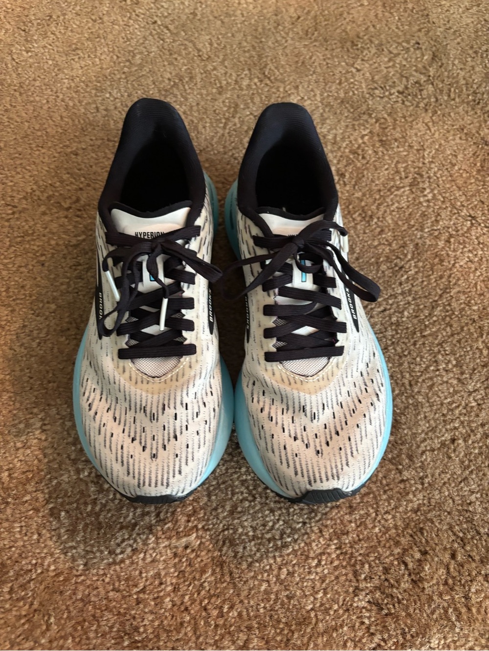 Women’s White & Light Blue Brooks running shoes in size 6